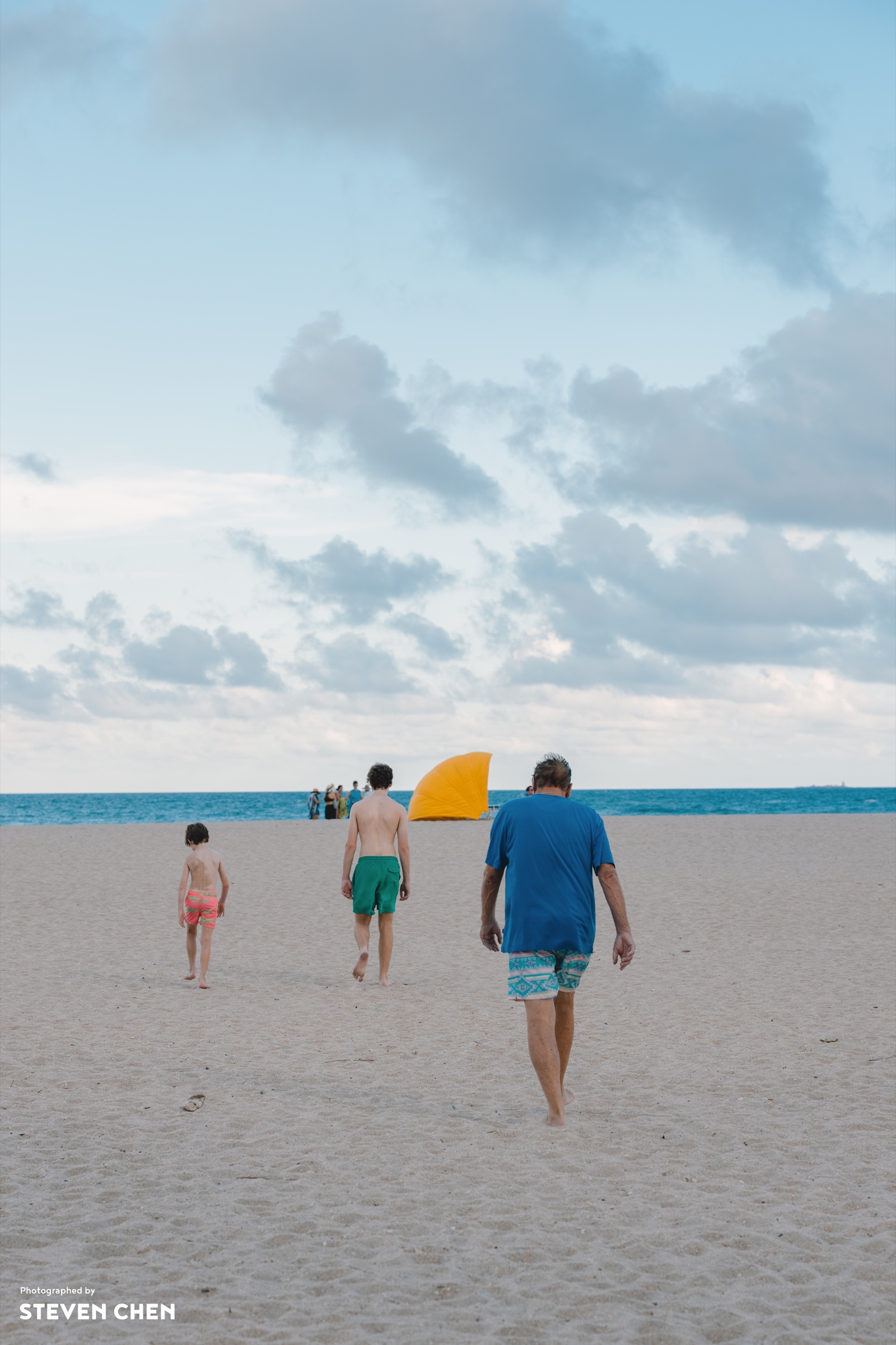 People at the Edge of the Tide